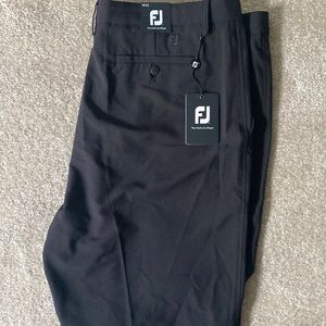 Mens new Footjoy black golf shorts. Size 42